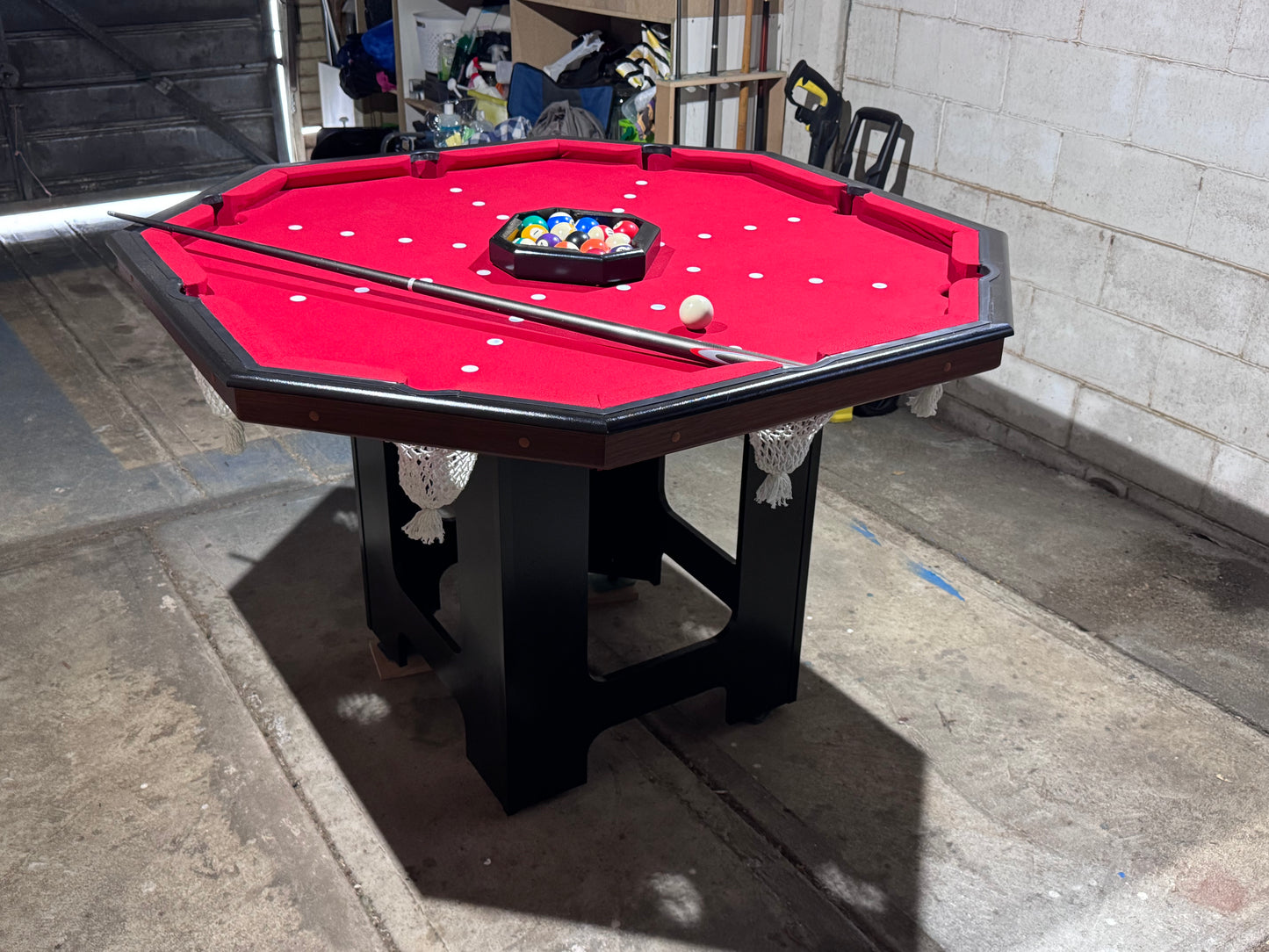 "Red Octable Pool Table in a modern game room"